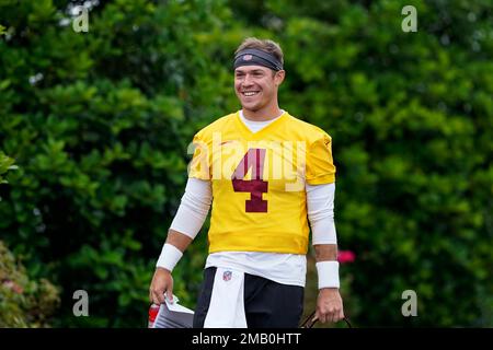 Washington Football Team quarterback Taylor Heinicke (4) warms up before an  NFL football game against the New York Giants on Sunday, Jan. 9, 2022, in  East Rutherford, N.J. (AP Photo/Adam Hunger Stock