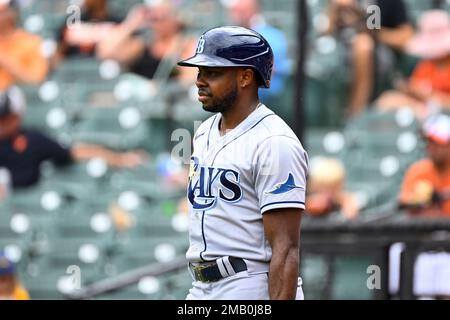 Tampa Bay Rays' Roman Quinn, right, stands on third base after hitting a  two-run triple in the seventh inning against the Kansas City Royals during  a baseball game Saturday, July 23, 2022