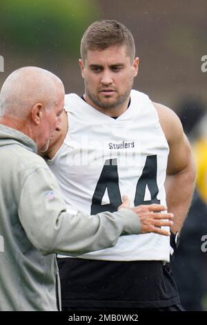 Pittsburgh Steelers running back Derek Watt (44) and Benny Snell Jr. (24)  talk with special teams coach Danny Smith before drills during practice at  their NFL football training camp facility in Latrobe