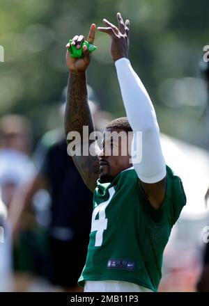 East Rutherford, NJ. 18/12/2022, New York Jets cornerback D.J. Reed (4)  breaks up a pass intended for Detroit Lions wide receiver Jameson Williams  (9) during a NFL game on Sunday, Dec. 18