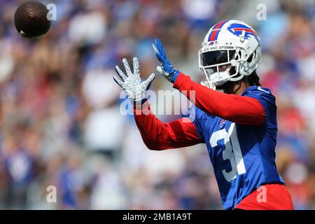 Chicago, United States. 24th Dec, 2022. Buffalo Bills safety Damar Hamlin  (3) celebrates a fumble recovery by teammate Tim Settle during the Bills  35-13 Christmas Eve win over the Chicago Bears at