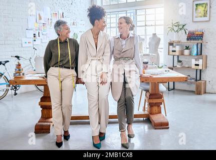 Teamwork, fashion and designer women in workshop for planning, idea and creative, thinking and goal. Group, partners and female team sharing vision Stock Photo