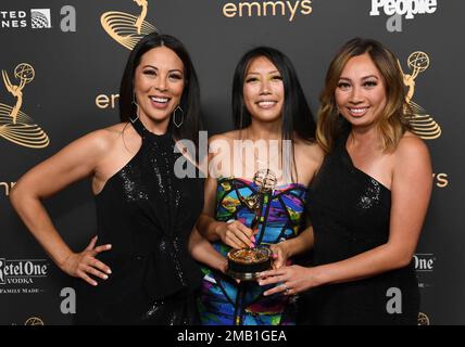 Cher Calvin, from left, Summer Yu and Kimberly Cheng backstage after ...