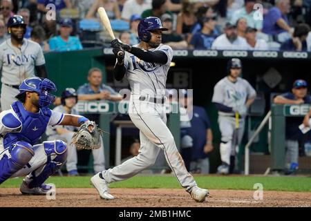 Tampa Bay Rays' Roman Quinn, right, stands on third base after hitting a  two-run triple in the seventh inning against the Kansas City Royals during  a baseball game Saturday, July 23, 2022