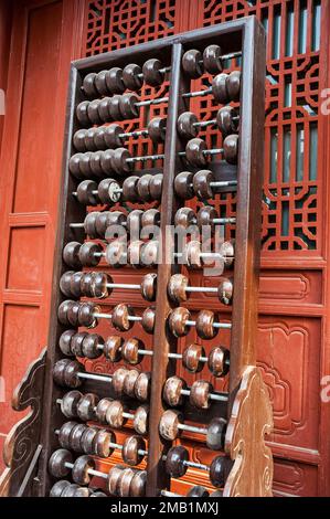 An abacus in front of a building at the Shanshangan guild hall in Kaifeng. Kaifeng was the capital of the Northern Song Dynasty. Henan Province, China