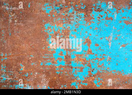 Rusted iron sheet, panel with old blue paint on surface as texture or background Stock Photo