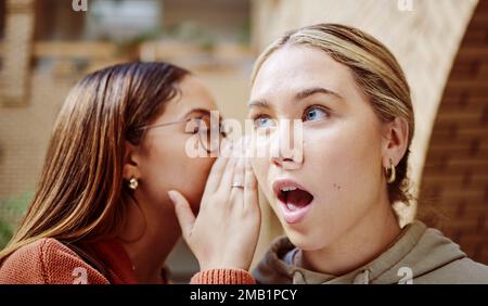 Women sharing a shocking secret Stock Photo - Alamy