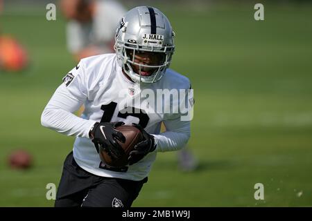 Miami. FL USA; Las Vegas Raiders wide receiver Justin Hall (12) makes a  reception during pregame warmups prior to an NFL preseason game against the Las  Vegas Raiders, Saturday, August 20, 2022