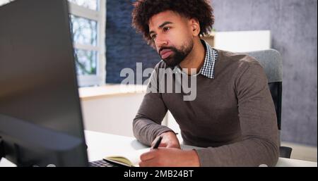 Virtual Online Training Program With Coach On Laptop Stock Photo
