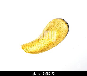 Creamy natural golden scrub on white Isolated background. Swatch. Liquid cosmetic, smudge texture Stock Photo