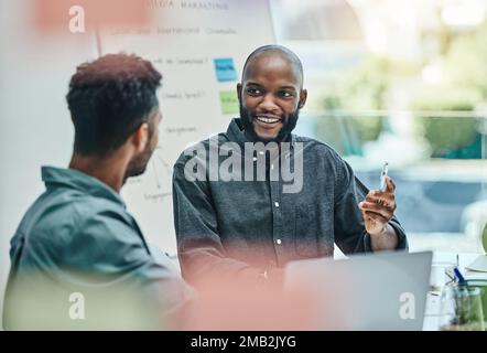 Im so glad youre here today. a businessman talking to his colleague during a meeting. Stock Photo