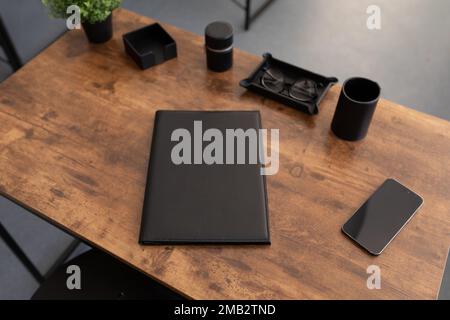 leather folder for documents on the office table in the office Stock Photo