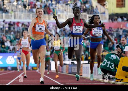 Fiordaliza Cofil, of the Dominican Republic, wins in the the 4x400 ...