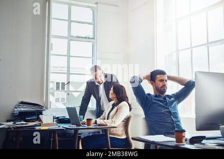 Business man, computer and relax in office after finishing project or task complete. Break, resting and male employee relaxing after hard work Stock Photo