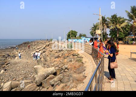 December 20 2022 - Mumbai, Maharashtra in India: People enjoy the area around the bandra beach Stock Photo