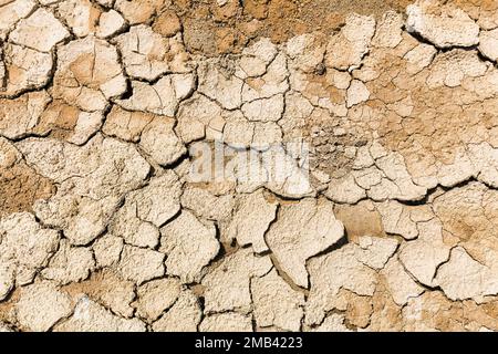 Parched soil, dry cracks after flooding, format-filling, drought, climate change, Andalusia, Spain Stock Photo