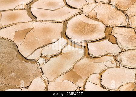 Parched soil, dry cracks after flooding, format-filling, drought, climate change, Andalusia, Spain Stock Photo