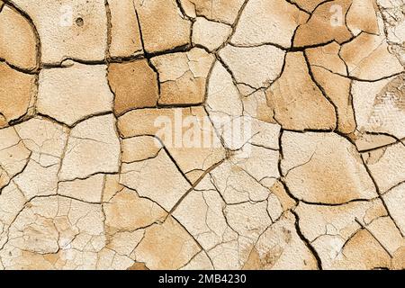 Parched soil, dry cracks after flooding, format-filling, drought, climate change, Andalusia, Spain Stock Photo