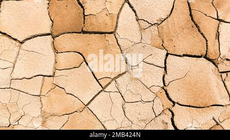 Parched soil, dry cracks after flooding, format-filling, drought, climate change, Andalusia, Spain Stock Photo