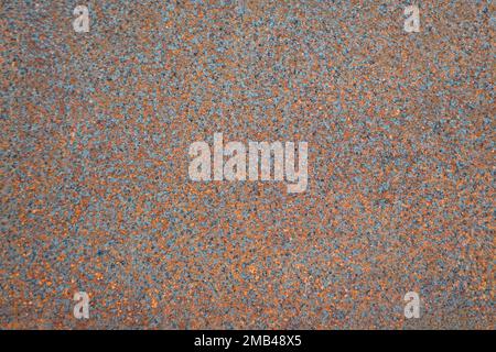 Closeup photo of rusty old metal surface. Orange and gray colors mottled background. Stock Photo