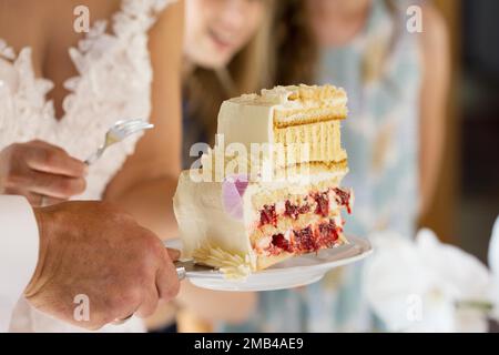 Multi-tiered cake is served at the cake buffet of a Barut wedding Stock Photo