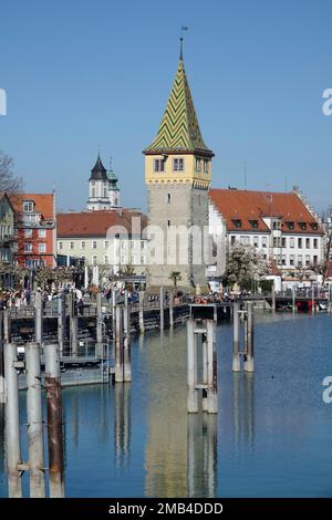 Harbour with Mangturm, behind towers of cathedral and church St. Stephan, Lindau am Lake Constance, Swabia, Bavaria, Germany Stock Photo