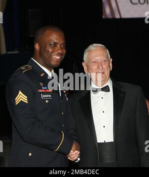 Fred Rutherford Taurus Secretary of Defense James Mattis, center, shakes U.S. Navy Adm. Craig ...
