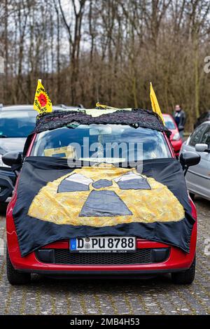 Banner with sign for radioactivity, flag Atomkraft Nein Danke, demonstration on car park in front of former nuclear power plant Wuergassen Stock Photo
