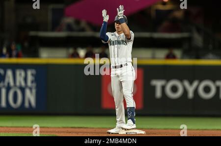 Sam Haggerty of the Seattle Mariners celebrates a run against the