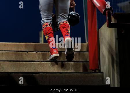 The Stance socks and New Balance cleats worn by New York Mets' Francisco  Lindor are seen as he stands on the dugout steps during a baseball game  against the Cincinnati Reds in