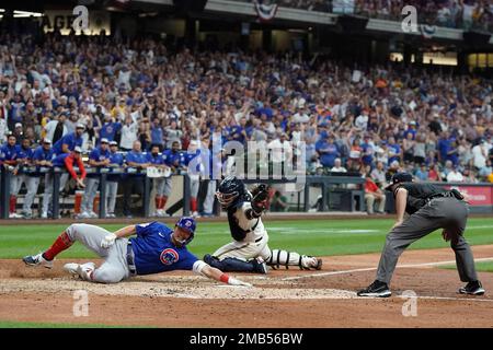 Seiya Suzuki of the Chicago Cubs hits a sacrifice fly in the first inning  of a baseball game against the Milwaukee Brewers on April 9, 2022, at  Wrigley Field in Chicago. (Kyodo)==Kyodo