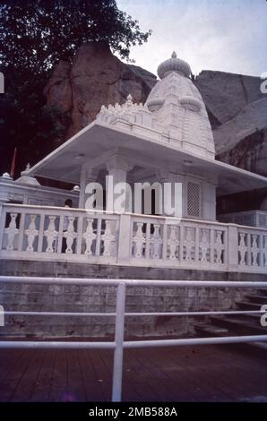 Birla Mandir is a Hindu temple, built on a 280 feet high hillock called Naubath Pahad on a 13 acres plot in Hyderabad, Telangana, India. The construction took 10 years and was opened in 1976 by Swami Ranganathananda of Ramakrishna Mission. temple dedicated to Buddha along with fresco paintings describing his life. The temple also has separate shrines for other gods such as Shiva, Ganesh, Saraswati, Hanuman, Brahma, Lakshmi and Saibaba. Stock Photo