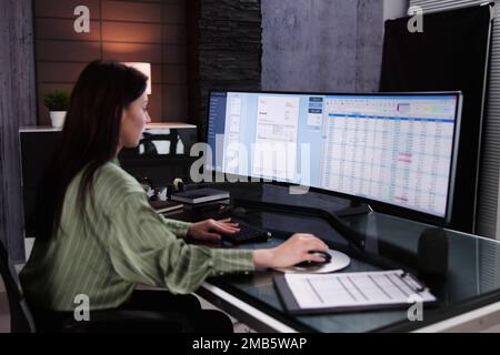 Account Manager In Office Coding Medical Bill Stock Photo