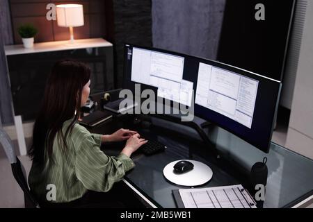Programmer Woman Coding On Computer. Coder Girl Stock Photo