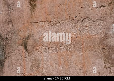 Brown color old damaged plaster wall surface for texture Stock Photo