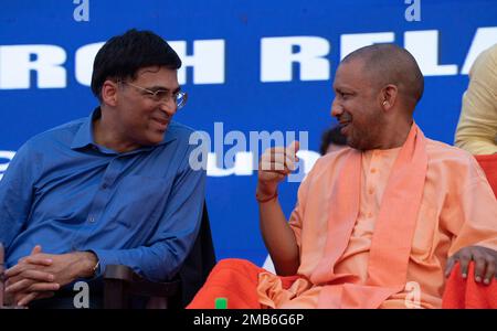 Yogi hands over Chess Olympiad torch to Viswanathan Anand