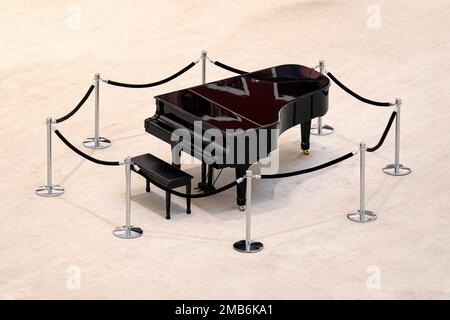 Grand piano on white background, top view. classic black piano on stage Stock Photo