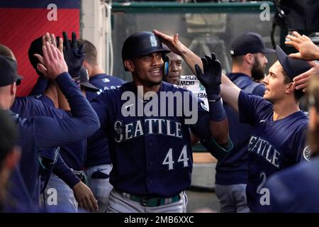 ANAHEIM, CA - JUNE 10: Seattle Mariners center fielder Julio Rodriguez (44)  raises a trident in the air after hitting a two run home run during an MLB  baseball game against the