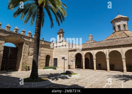 The courtyard in the Alcazar of Jerez de la Frontera with the ancient mosque converted into a chapel. Andalusia, Spain. Stock Photo