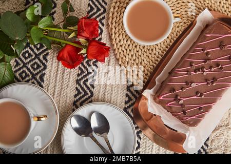 https://l450v.alamy.com/450v/2mb7b5a/valentines-day-breakfast-with-cherry-chocolate-cake-coffee-cups-red-roses-and-aesthetic-background-2mb7b5a.jpg