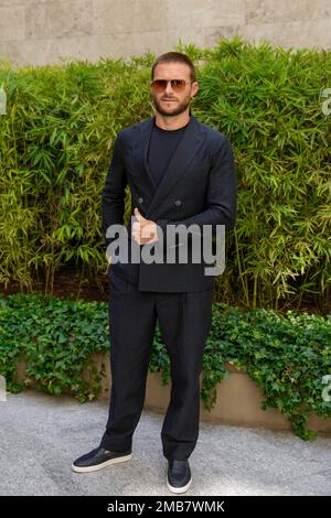 Scott Eastwood poses for photographers before the Giorgio Armani