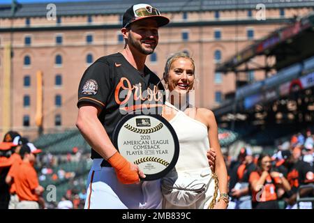 Baltimore Orioles' Trey Mancini and fiancé Sara Prelman pose with