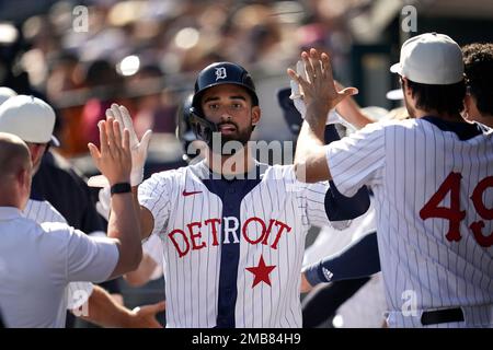 Detroit Tigers Zack Short wears a Red Wings hockey helmet as celebrates in  the dugout after hitting a three-run home run against the Kansas City  Royals, Wednesday, May 24, 2023, in Kansas