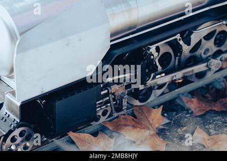 Old steam train wheel mechanism on a railway Stock Photo