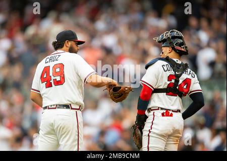 Atlanta Braves relief pitcher Jesus Cruz warms up before a baseball game  against the Colorado Rockies Thursday, June 2, 2022, in Denver. (AP  Photo/David Zalubowski Stock Photo - Alamy