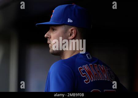 Chicago Cubs pitcher Matt Swarmer (67) throws during the first