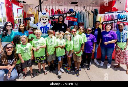 IMAGE DISTRIBUTED FOR JC PENNEY - Dallas Cowboys Wide Receiver, CeeDee  Lamb, center, joins Frisco Mayor Pro Temp Angelia Pelham and Councilwoman  Tammy Meinershagen to celebrate JCPenney's 120th birthday by gifting kids  from the Collin