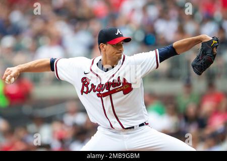 Atlanta Braves starting pitcher Charlie Morton wipes his face