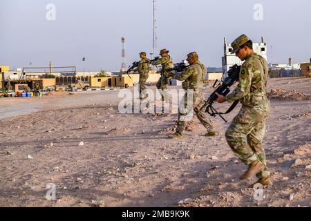 U.S. Soldiers assigned to Task Force Hurricane from the 1st Battalion, 124th Infantry Regiment, move in line during a platoon immersion in Al-Kharj, Kingdom of Saudi Arabia, June 13, 2022. The immersion was a training event meant to build interoperability between the U.S Army and Royal Saudi Land Force at the platoon level while enhancing both U.S. and partner nation skillsets. Stock Photo