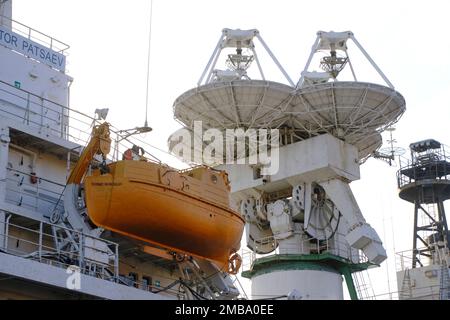 Radar antenna and lifeboat are located ship Stock Photo - Alamy